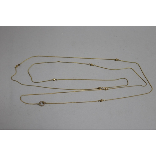 260 - Antique 9ct gold long muff chain, approx 7 grams