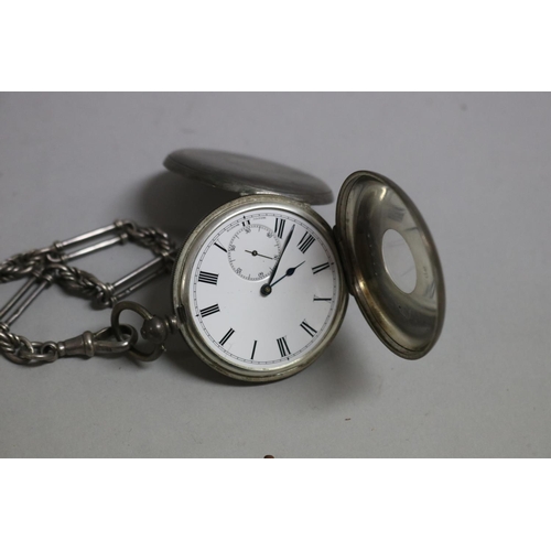 269 - Hall marked silver fob chain, silver pocket watch & silver sovereign case and two watch keys, untest... 