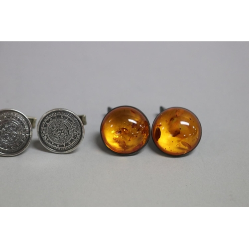 275 - Three pairs of cufflinks, Wedgwood, Mexico silver and  amber  (6)