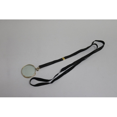 283 - Antique monocle on black ribbon, approx 4.5cm dia