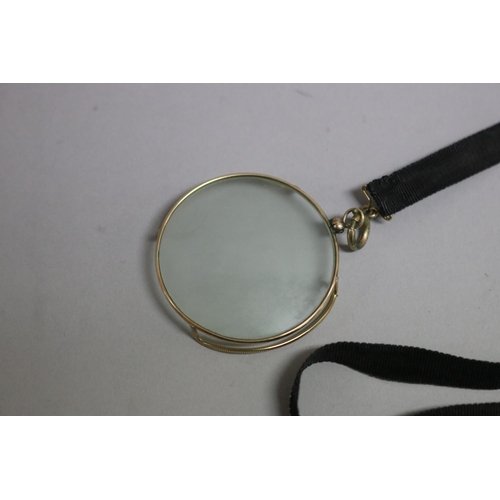 283 - Antique monocle on black ribbon, approx 4.5cm dia