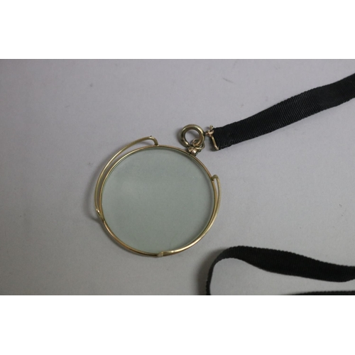 283 - Antique monocle on black ribbon, approx 4.5cm dia