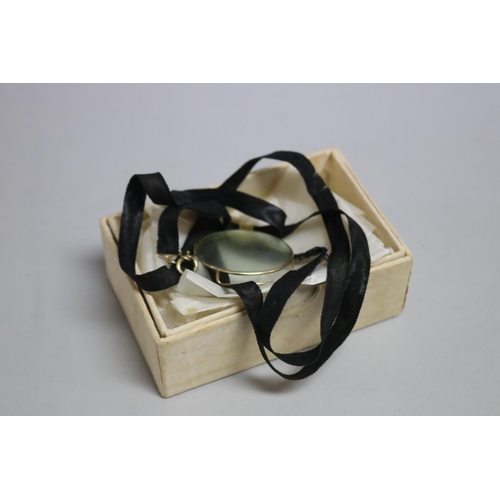283 - Antique monocle on black ribbon, approx 4.5cm dia