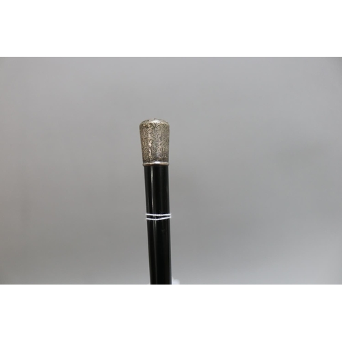 93 - Edwardian silver mounted ebony conductors baton, inscribed Presented To Dr E Kew-Herring by St Austi... 