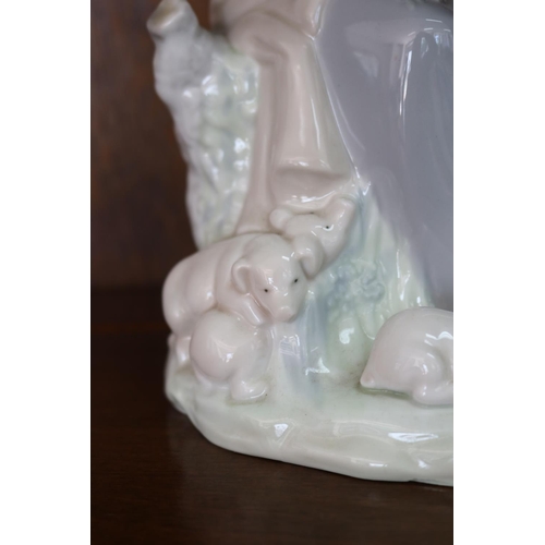5024 - Nao figure - seated lady with piglets, approx 25cm H