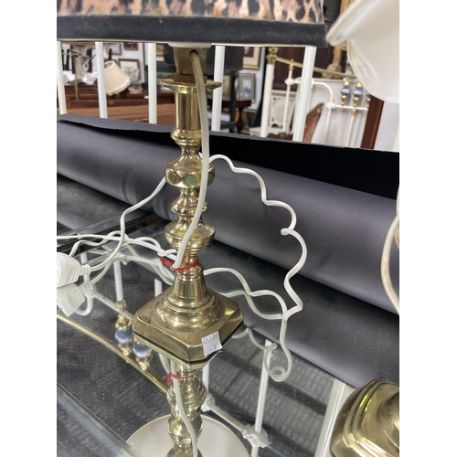 5049 - Two brass candlesticks made into lamps, unknown working condition, approx 44cm H and shorter (2)
