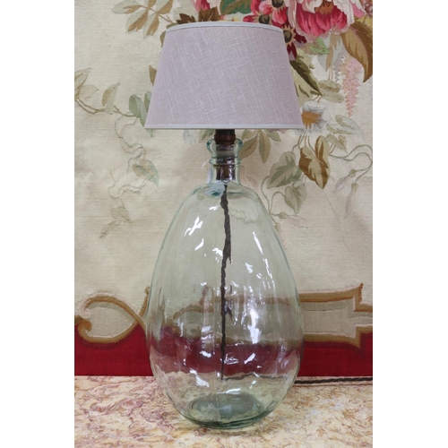 5067 - Glass bottle form lamp, unknown working order, approx 63cm H