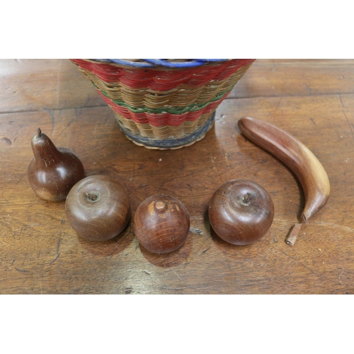 5141 - Carved wood fruits in a vintage basket, approx 21cm H x 31cm Dia and smaller