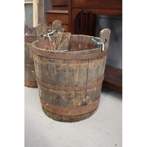 5155 - Antique French twin handled wooden barrel with iron strapping, in distressed condition and can possi... 