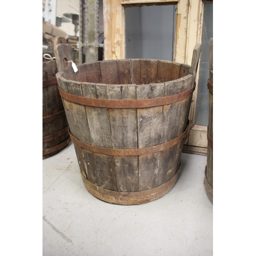 5156 - Antique French twin handled wooden barrel with iron strapping, in distressed condition and can possi... 