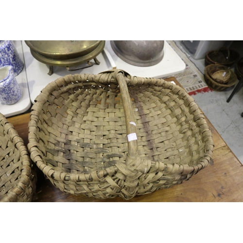 5280 - Two French woven baskets, approx 18cm H (excluding handle) x 56cm W x 35cm D & smaller (2)