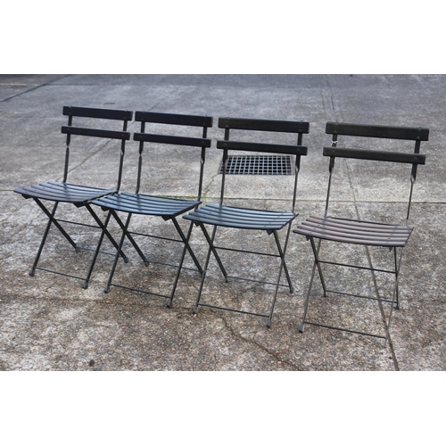 5260 - Four black folding chairs (4)