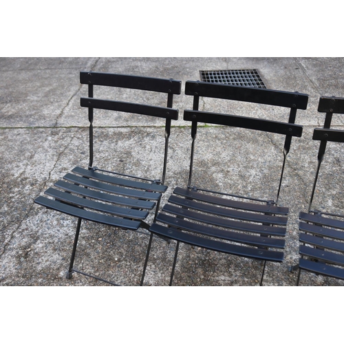 5260 - Four black folding chairs (4)