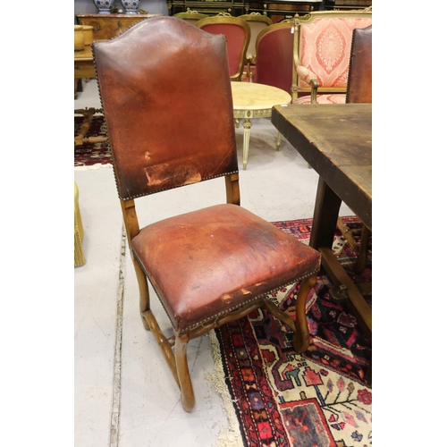 49 - Set of six French oak framed studded leather high back dining chairs, showing distressing to leather... 