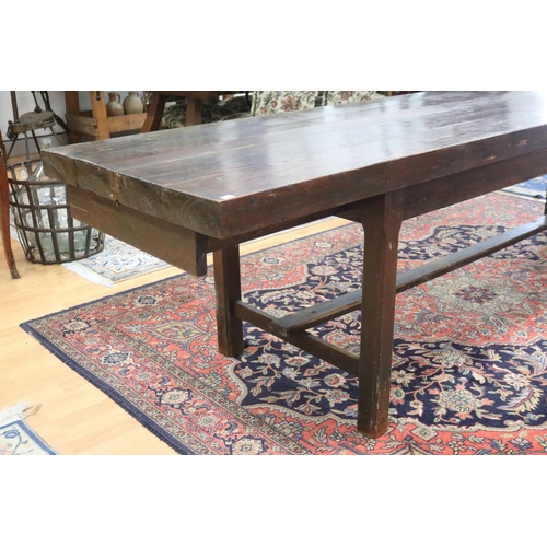 90 - Long antique style slab top trestle table, champhered square legs, with central stretcher, approx 76... 