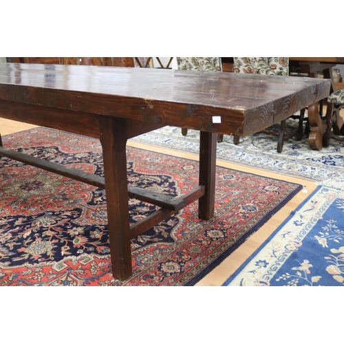 90 - Long antique style slab top trestle table, champhered square legs, with central stretcher, approx 76... 