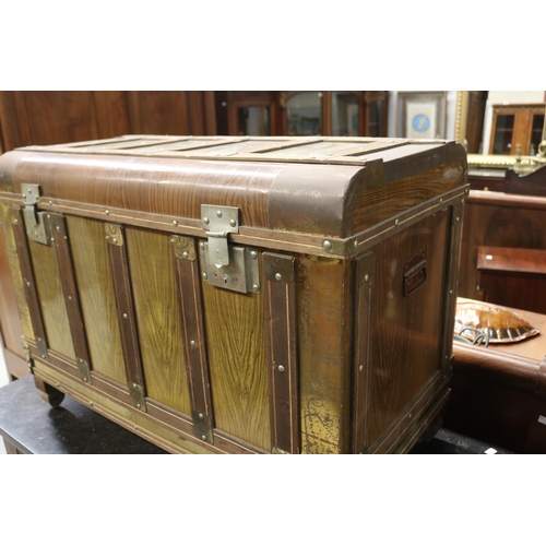 115 - Faux wood grain tin trunk, original interior and paper label, approx 65cm H x 89cm W x 47cm D