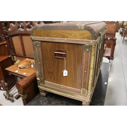 115 - Faux wood grain tin trunk, original interior and paper label, approx 65cm H x 89cm W x 47cm D