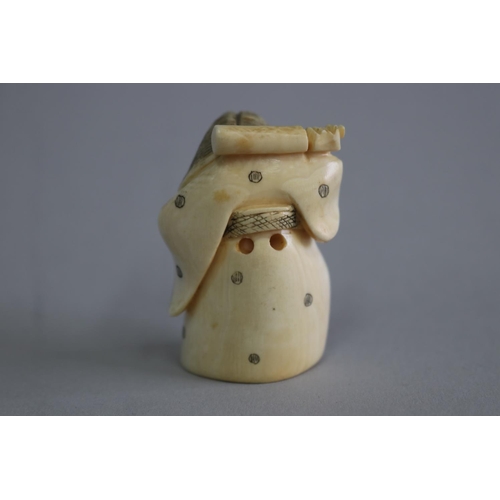 20 - Japanese carved ivory netsuke dual face man, revolving face, signed to base, approx 5.5cm H x 4cm L