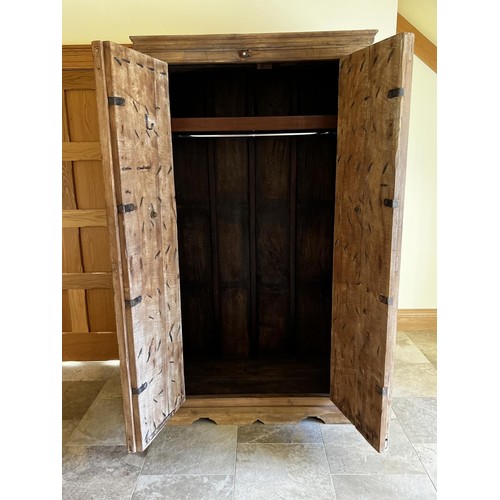 390 - Large Indian hardwood and iron mounted two door robe, approx 107cm W x 75cm D x 120cm H