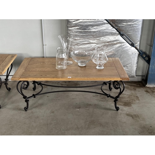 404 - Quality oak topped hand forged wrought iron based coffee table, approx 48cm H x 130cm L x 71cm W
