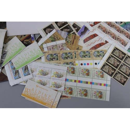 121 - Assortment of unused stamps valued from 30 cents to $2 and some English