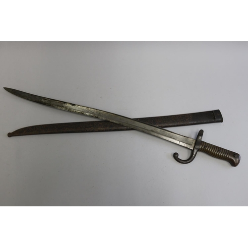 137 - French Chassepot Model 1866 bayonet with scabbard. Complete and in reasonable to good condition.