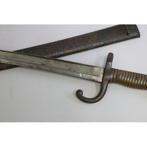 137 - French Chassepot Model 1866 bayonet with scabbard. Complete and in reasonable to good condition.