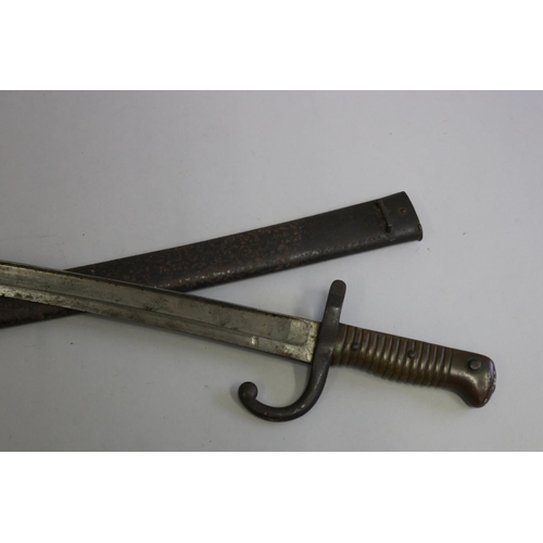 137 - French Chassepot Model 1866 bayonet with scabbard. Complete and in reasonable to good condition.