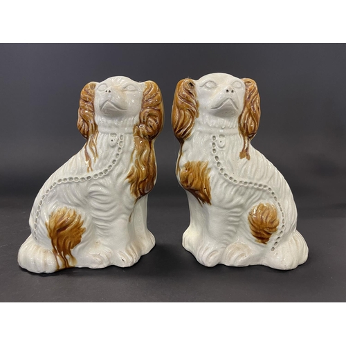 116 - Pair of Staffordshire style dogs with tan highlights, approx 23cm H (2)