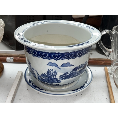 121 - Chinese Blue and white planter with under dish, approx 21 cm H, 28 cm W.