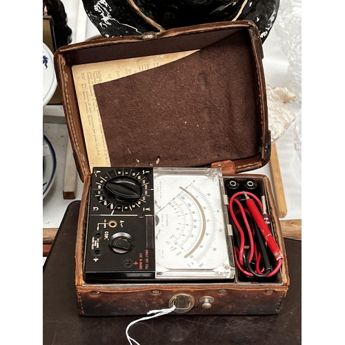 131 - Vintage Multimeter in leather case, approx 9cm H x 22cm W x 15cm D