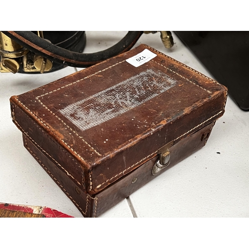 136 - Vintage Multimeter in leather case, approx 9cm H x 21cm W x 15cm D