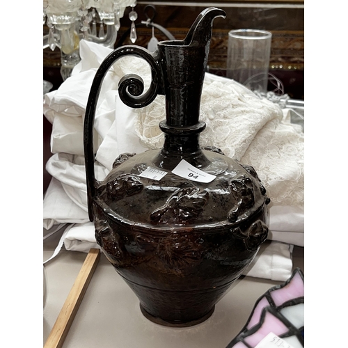 141 - Brown glaze pottery ewer, approx 33cm