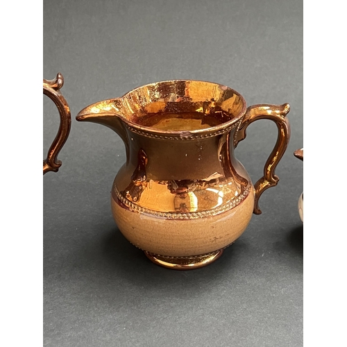 210 - Four antique copper lustre jugs (4)  approx 12 cm H and smaller -  approx 12 cm H and smaller