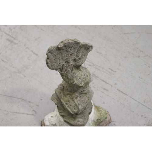 834 - Composite stone dolphin figure on stand, approx 54cm H x 20cm W