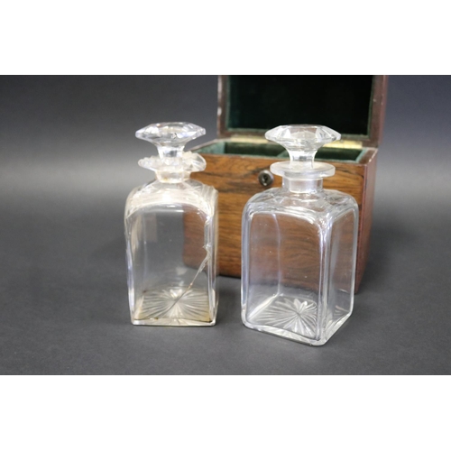 1015 - Antique rosewood decanter box fitted with two cut glass decanters, (one decanter with a crack), appr... 