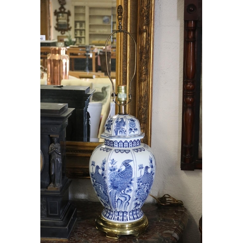 1040 - Pair of Chinese porcelain blue and white lamps bases, cast brass bases, approx 79cm H each (2)