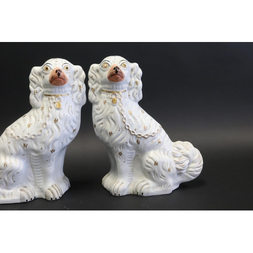 1049 - Large pair of antique Staffordshire pottery dogs, each approx 31cm H x 26cm W (2)