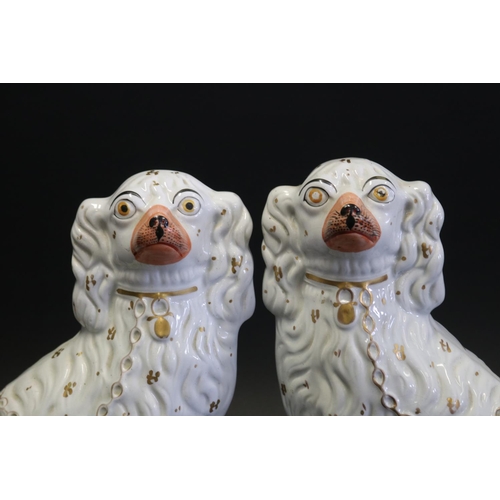 1049 - Large pair of antique Staffordshire pottery dogs, each approx 31cm H x 26cm W (2)