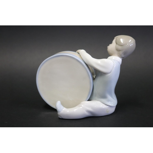 1063 - Lladro porcelain figure boy with bass drum, approx 12cm H x16cm W