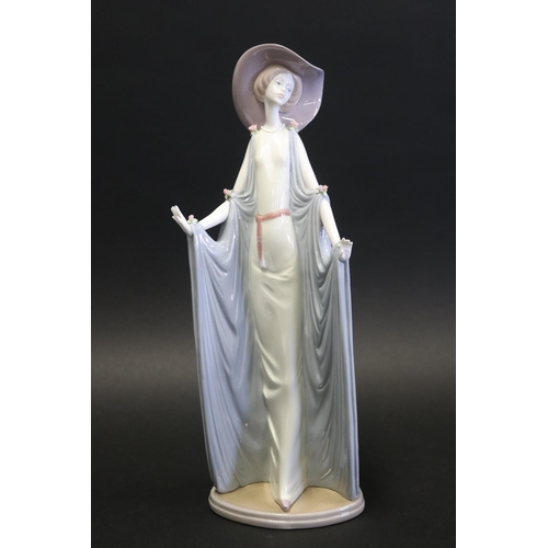 1066 - Lladro porcelain figure lady in hat, has been re-glued, damage to hand and fingers, approx 35cm H