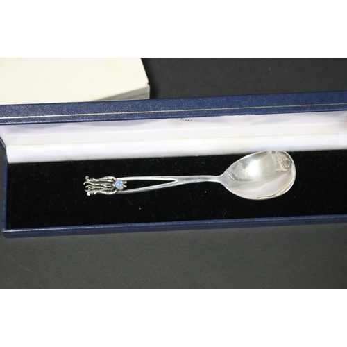 1081 - Australian Flynn sterling silver spoon, set with opal in the form of a lyrebird. Boxed