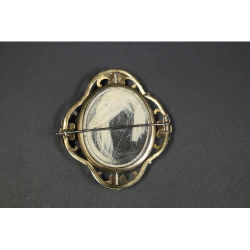 1083 - Large antique Victorian Scottish pinchbeck oval brooch, C scroll frame with central oval carved ivor... 