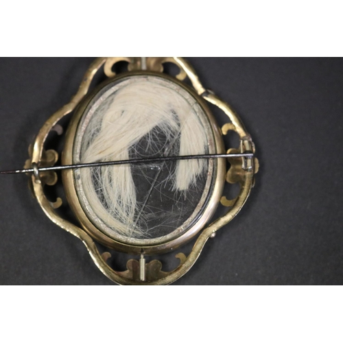 1083 - Large antique Victorian Scottish pinchbeck oval brooch, C scroll frame with central oval carved ivor... 