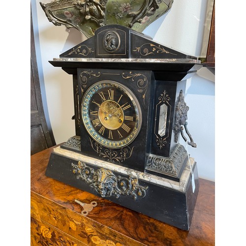 1026 - A late 19th Century French clock by Wales & McCulloch of Paris, the 5ins diameter black chapter ring... 