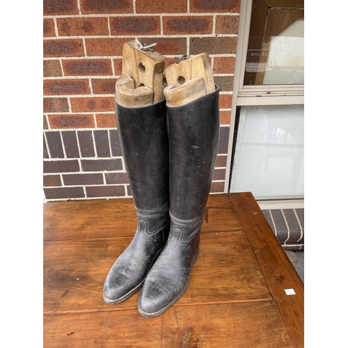 554 - Pair of antique French leather riding boots with wooden blocks, approx 58cm H and shorter (2)