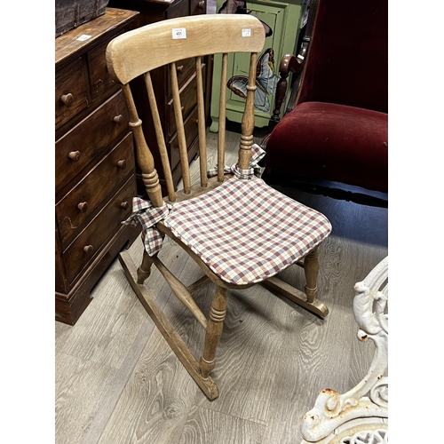 583 - Antique small scale English beech and pine country rocking chair