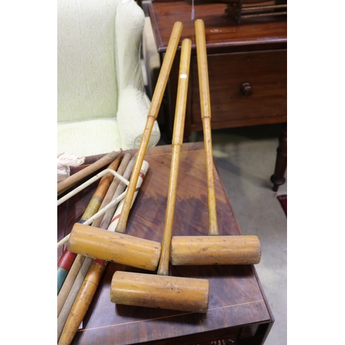 600 - Three old George G G Bussy & Co mallets, metal hoop, quoits, bee keepers masks, various stumps (coll... 