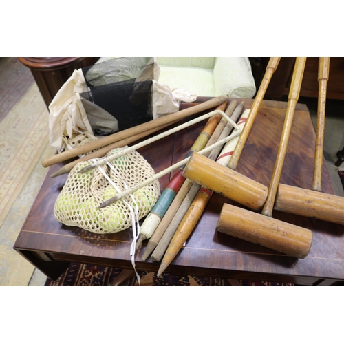 600 - Three old George G G Bussy & Co mallets, metal hoop, quoits, bee keepers masks, various stumps (coll... 